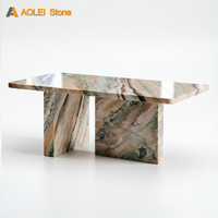 Table à manger portable 6 places en marbre onyx coloré, design moderne et vibrant, avec plateau rond et pieds inclinés, pour la maison et les halls d'hôtels de luxe