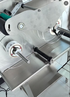 Machine d'étiquetage rotative automatique à rouleaux NASCENCE avec capteur d'étiquettes transparentes pour emballage papier 220V 300W pour liquides émulsionnels