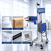 Machine de marquage laser CO2 automatique pour codes QR et dates d'expiration, prend en charge les formats DXF, PLT, BMP, AI, pour aluminium et métal