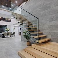 Escalier en colimaçon moderne de style minimaliste 2026 avec marches en bois massif pour projets résidentiels et villas