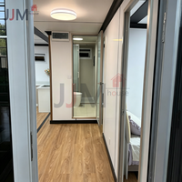 JJM Maison conteneur pliable en acier moderne et extensible de 20 pieds, villa préfabriquée à 2-3 chambres pour usage commercial
