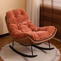 Fauteuil à bascule capitonné de style mid-century de haute qualité avec structure métallique durable et revêtement en tissu pour salon et mobilier de maison