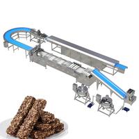 Automatische productielijn voor eiwitrepen, ontbijtrepen en granolarepen; machine voor het maken van energierijen.