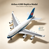 Maquette d'exposition Airbus A380 China Southern Airlines avec carrosserie blanche, aile arrière bleue, logo rouge Kapok, quatre moteurs et train d'atterrissage