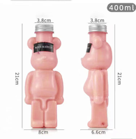 Design de mode 400ml 500ml 700ml bouteilles de boisson en forme d'ours bouchon en aluminium emballage en plastique PET pour jus eau lait bouteille de thé