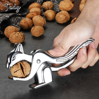 Eco-vriendelijke creatieve walnoottang van roestvrij staal, notenkraker, gratis sample, keukenhulpmiddelen, fruit- en groenteboor.