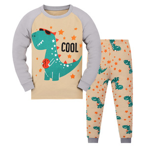 Vente en gros de pyjamas pour enfants en coton 100% doux et respirant, ensemble de pyjamas à manches longues avec motif de dinosaure et de camion - Product Image 1