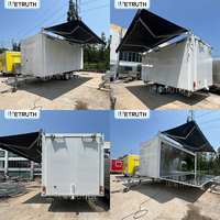 Remorque de présentation de vêtements mobile moderne Wetruth avec auvent pliable, rails à vêtements et éclairage LED intégré pour salle d'exposition