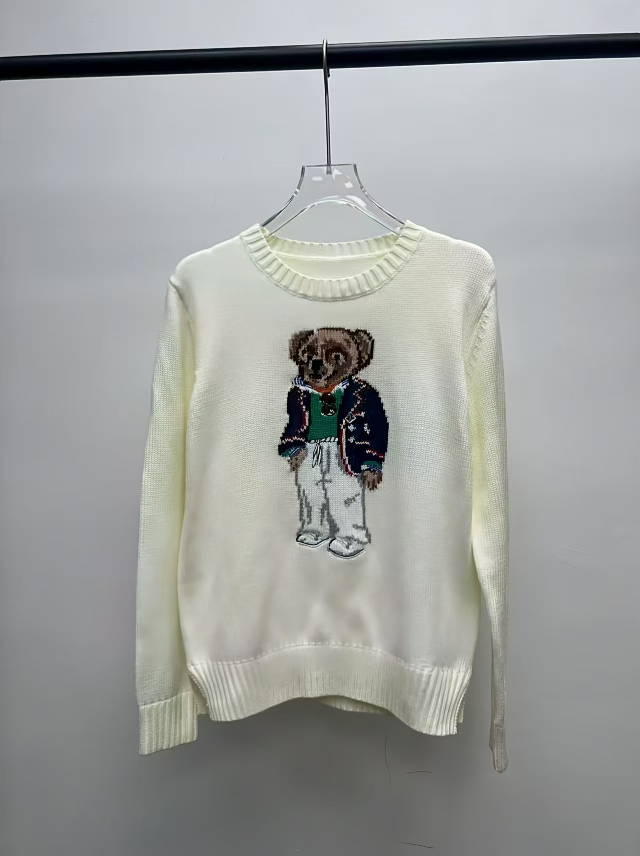 White bear in blue clothes