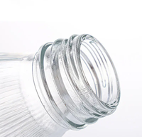 Bouteilles en verre pour jus d'été avec couvercle pour l'eau