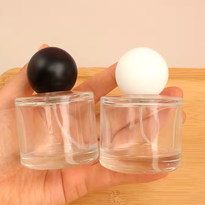 High Quality Wholesale Travel Refill Custom Glass Perfume <b>Bottle</b> Round Perfume <b>Bottle</b> with White Round Cap - Product Image 1