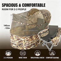 Abri de chasse compact et pop-up pour une personne, avec chaise intégrée, pour la chasse au canard, doté d'un système de dissimulation avancé et d'un filet transparent.