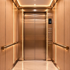 Ascensor de Pasajeros Contemporáneo de Acero Inoxidable, Tipo de Tracción sin Engranajes, 380V, Fácil Operación, Interior con Piso de Mármol - Product Image 1
