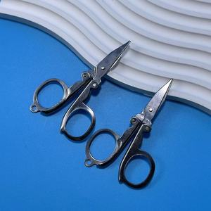 ขายตรงจากโรงงาน กรรไกรพับสแตนเลสสำหรับเดินทาง น้ำหนักเบา พกพาสะดวก ใช้ในบ้านและในชีวิตประจำวัน - Product Image 2