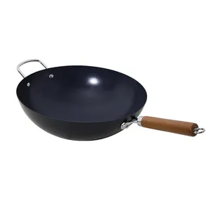 Vente en gros wok traditionnel chinois antiadhésif wok en acier au carbone avec nitruration avec manche en bois