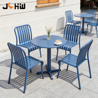 Ensemble de table et chaises de salle à manger d'extérieur en aluminium empilable au design moderne, résistant à la rouille, pour café et restaurant - Vente chaude