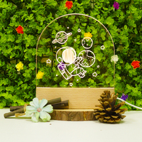 Motif astronaute ovale acrylique lumière chaude/blanche cadeau USB 3D bois LED Base ensemble cadeau promotionnel lampes cadeau de noël