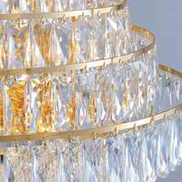 Lustre en cristal de luxe sur plusieurs niveaux, forme de tour dorée, luminaire suspendu en acier pour villa, hôtel, hall d'entrée, escalier