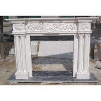 Cheminée d'intérieur de style européen sculptée à la main Cheminée en marbre blanc décorative autoportante Style de designer