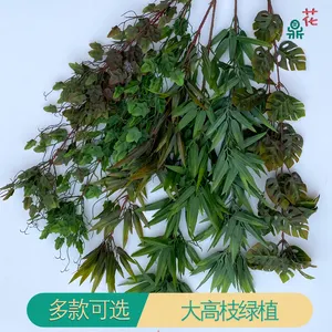 Grandi rami alti foglie di tartaruga foglie di bambù foglie di uva decorazione di nozze composizione floreale