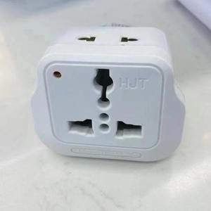 Hut Universal Travel Adapter All In One European And British Style <b>White</b> AC <b>Port</b> 100-240V ABS Material - Product Image 1