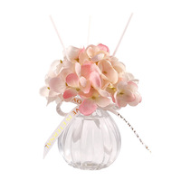 Diffuseur de parfum de luxe en verre en forme de citrouille avec fleur artificielle d'hortensia pour l'aromathérapie, idéal pour les mariages, les fêtes et la décoration intérieure