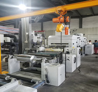 Machine à plastifier pour papier à cigarettes