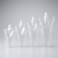 Pochette souple transparente en PE de 0,2 mm anti-fuite avec bec verseur central pour l'emballage de jus et de boissons liquides