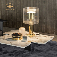 Table basse de salon de designer italien minimaliste, en dalle de marbre de forme spéciale, modèle personnalisé pour maison individuelle
