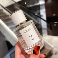 Flacon de parfum en verre de haute qualité de 50 ml, fond épais, cylindrique, vertical, avec bouchon à vis, pulvérisateur, sérigraphie