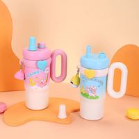 Vente en gros usine : Ensemble de thermos à eau en acier inoxydable 316, tasse isotherme jumbo de haute qualité avec motif graffiti de dessin animé et poignée pipette