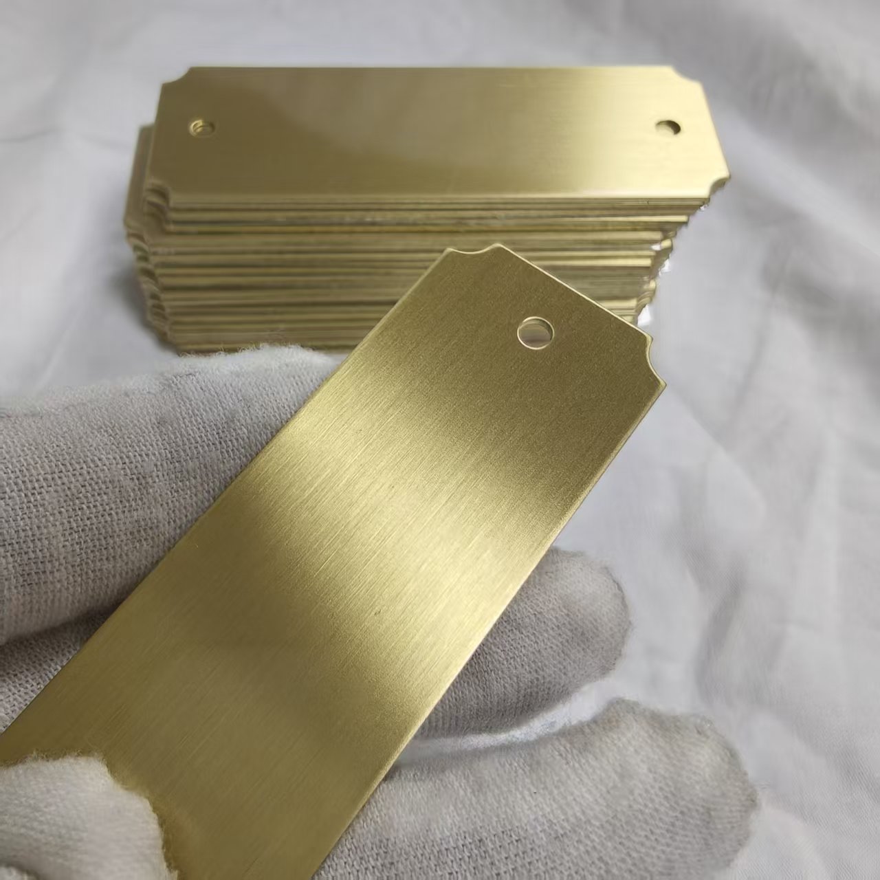 Gold  chamfered with holes and screws
