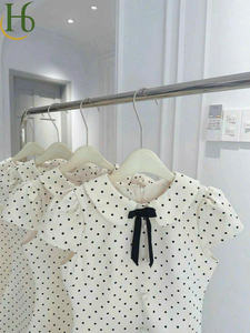 Vestido blanco con lunares y cuello Peter Pan, con lazo negro, manga corta, corte en A, estilo vintage, informal, de poliéster. - Product Image 2