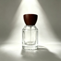 Flacon de parfum vide de luxe 30ml 50ml 100ml avec logo personnalisé, atomiseur en verre et bouchon en bois