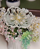 Fleurs décoratives artificielles perlées pour décoration de mariage, présentoir de boutique de cadeaux, pour douche nuptiale et présentation de cadeaux en magasin.