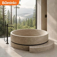 Baignoire ronde en pierre naturelle à double couche, style japonais avec base et marches, idéale pour les pavillons de spa et les espaces bien-être