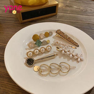 กิ๊บติดผมรูปดาวประดับมุก ชุดเครื่องประดับโบว์ติดผมรูปปลาดาว - Product Image 2