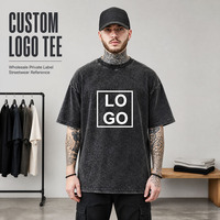 T-shirt graphique noir vieilli pour homme avec logo en cadre blanc – Collection de vêtements streetwear personnalisés en gros pour la vente au détail