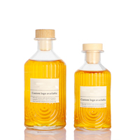 Bouteille vide moderne de diffuseur d'arôme en verre clair de conception avancée avec bouchon en bois