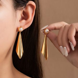 ต่างหูสแตนเลสสำหรับสุภาพสตรีต่างหูหินรูปวงรีสีทองหรูหราสำหรับ Diwali และกลับไปโรงเรียน - Product Image 3