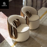 Fauteuil pivotant en cuir et métal au design italien moderne, mobilier d'appoint de luxe haut de gamme pour villa, salon et chambre à coucher