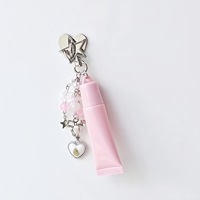 Tube de brillant à lèvres rose de 8 ml/15 ml avec anneau sur le dessus, crème pour les yeux avec pendentif, échantillon de crème pour le visage.