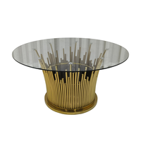 Table à manger ronde avec plateau en verre transparent et base en acier inoxydable doré