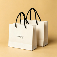 Sacs en papier personnalisés avec logo imprimé, sacs de shopping de luxe pour vêtements, sacs cadeaux recyclables pour boutique avec ruban et corde