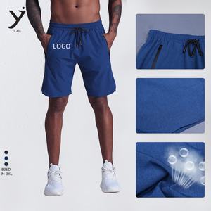 Pantalones cortos deportivos de cinco piezas ligeros que absorben la humedad de tiro medio de entrenamiento informal de verano para hombre - Product Image 2