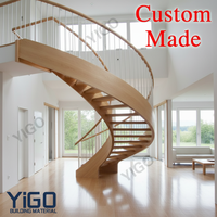 Escalier en colimaçon intérieur moderne, durable et écologique avec main courante en verre trempé et construction en acier inoxydable, certifié ISO9001