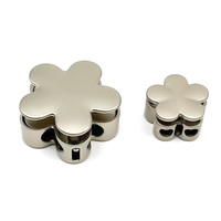 Vente en gros d'attaches en corde métallique pour vêtements fermoirs à ressort en forme de fleur ajustage élastique veste pièces accessoires bouchon