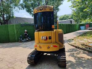 Mini-excavatrice CAT 303, poids opérationnel de 3 tonnes, capacité de la benne de 0,1 m³, équipement de construction hydraulique jaune - Product Image 2