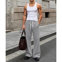 Pantalon de survêtement ample pour homme, coupe bootcut, jambe large évasée, taille élastique avec cordon de serrage, en coton, pour la détente, l'entraînement, la gym et la course à pied