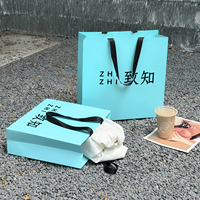 Conteneurs d'art de luxe personnalisés avec logo, sacs de shopping pour montres, personnalisation, recyclables, pour boutiques, petites séries, estampage à chaud, ruban, bougie